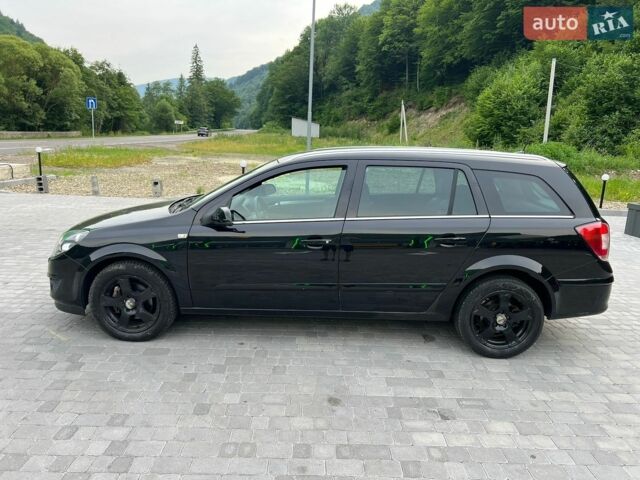 Чорний Опель Астра, об'ємом двигуна 1.6 л та пробігом 237 тис. км за 5550 $, фото 6 на Automoto.ua