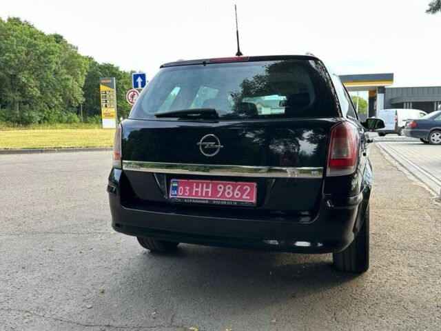 Черный Опель Астра, объемом двигателя 1.6 л и пробегом 152 тыс. км за 4800 $, фото 6 на Automoto.ua