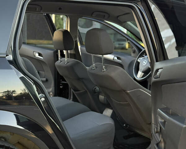 Черный Опель Астра, объемом двигателя 1.6 л и пробегом 194 тыс. км за 6499 $, фото 17 на Automoto.ua