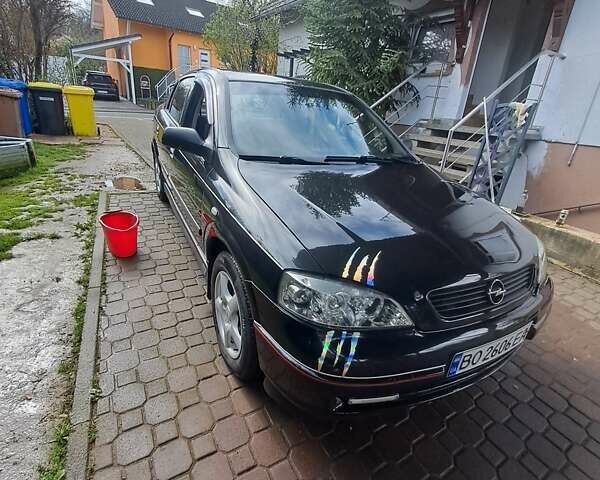 Черный Опель Астра, объемом двигателя 1.6 л и пробегом 245 тыс. км за 4500 $, фото 1 на Automoto.ua