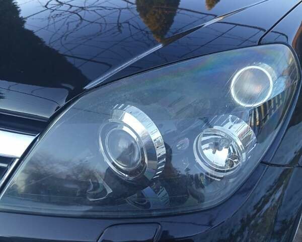 Черный Опель Астра, объемом двигателя 1.6 л и пробегом 207 тыс. км за 5500 $, фото 26 на Automoto.ua