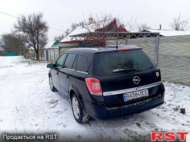 Черный Опель Астра, объемом двигателя 1.6 л и пробегом 199 тыс. км за 5200 $, фото 12 на Automoto.ua