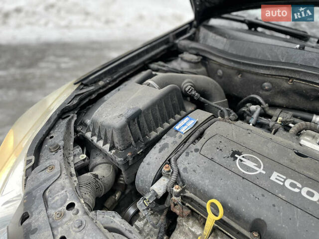 Черный Опель Астра, объемом двигателя 1.8 л и пробегом 218 тыс. км за 4850 $, фото 43 на Automoto.ua