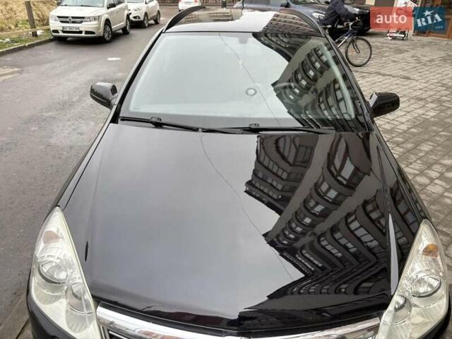 Черный Опель Астра, объемом двигателя 1.7 л и пробегом 276 тыс. км за 5200 $, фото 12 на Automoto.ua