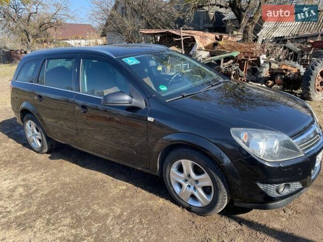 Черный Опель Астра, объемом двигателя 1.6 л и пробегом 295 тыс. км за 4850 $, фото 3 на Automoto.ua