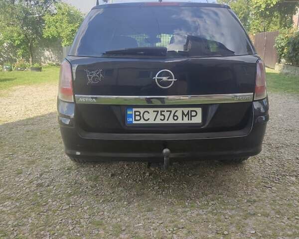 Чорний Опель Астра, об'ємом двигуна 1.7 л та пробігом 250 тис. км за 6000 $, фото 6 на Automoto.ua