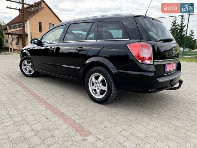 Черный Опель Астра, объемом двигателя 1.6 л и пробегом 222 тыс. км за 5200 $, фото 2 на Automoto.ua