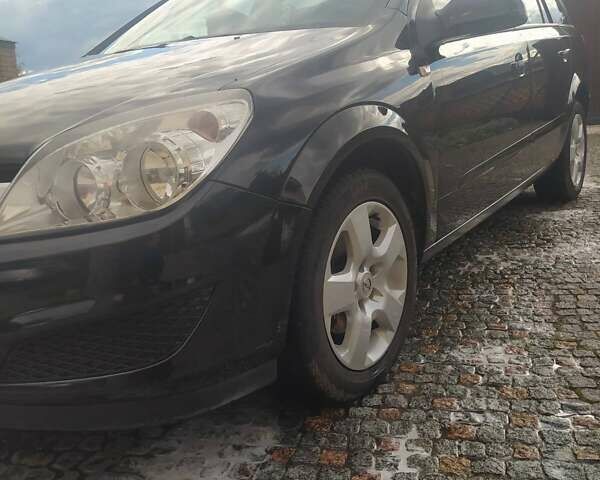 Черный Опель Астра, объемом двигателя 1.6 л и пробегом 200 тыс. км за 6000 $, фото 13 на Automoto.ua
