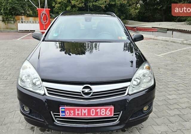 Черный Опель Астра, объемом двигателя 1.6 л и пробегом 209 тыс. км за 5850 $, фото 7 на Automoto.ua