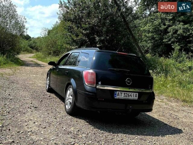 Чорний Опель Астра, об'ємом двигуна 1.69 л та пробігом 206 тис. км за 3250 $, фото 3 на Automoto.ua