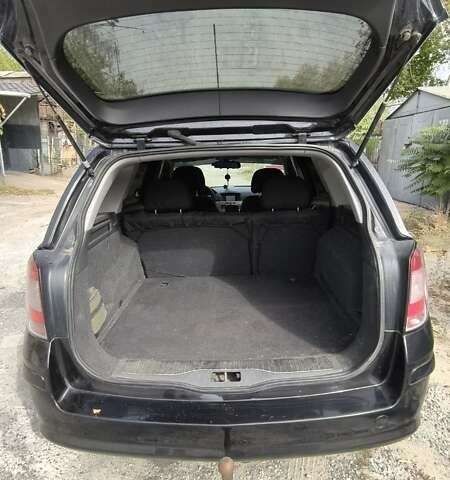 Черный Опель Астра, объемом двигателя 1.6 л и пробегом 267 тыс. км за 5500 $, фото 3 на Automoto.ua