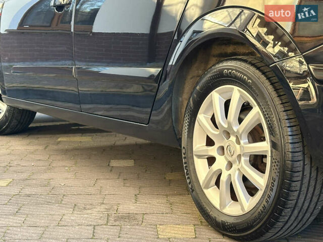 Черный Опель Астра, объемом двигателя 1.6 л и пробегом 180 тыс. км за 5499 $, фото 46 на Automoto.ua