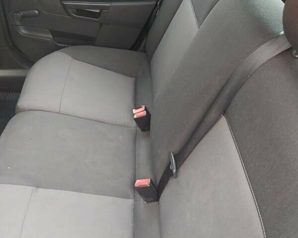 Черный Опель Астра, объемом двигателя 1.6 л и пробегом 200 тыс. км за 6000 $, фото 6 на Automoto.ua