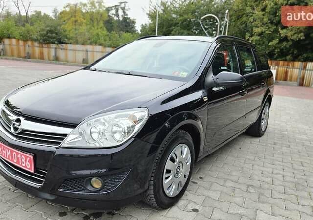 Черный Опель Астра, объемом двигателя 1.6 л и пробегом 209 тыс. км за 5850 $, фото 6 на Automoto.ua