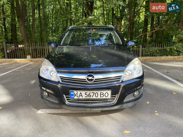 Черный Опель Астра, объемом двигателя 1.8 л и пробегом 145 тыс. км за 5900 $, фото 1 на Automoto.ua