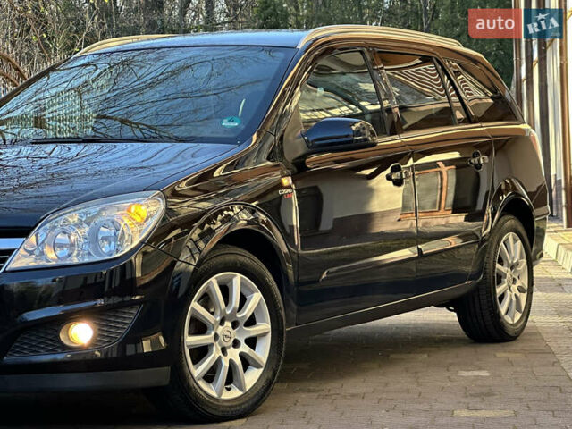 Черный Опель Астра, объемом двигателя 1.6 л и пробегом 180 тыс. км за 5499 $, фото 18 на Automoto.ua