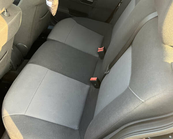 Черный Опель Астра, объемом двигателя 1.69 л и пробегом 270 тыс. км за 5500 $, фото 8 на Automoto.ua