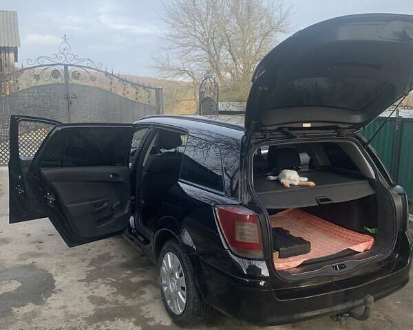 Черный Опель Астра, объемом двигателя 1.69 л и пробегом 250 тыс. км за 6500 $, фото 16 на Automoto.ua