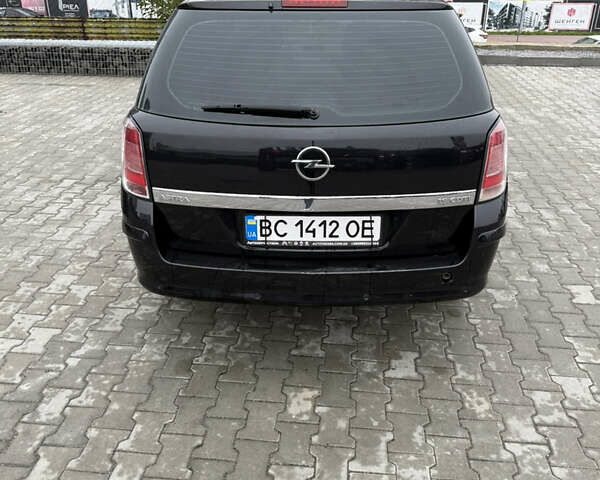 Черный Опель Астра, объемом двигателя 1.9 л и пробегом 255 тыс. км за 6200 $, фото 3 на Automoto.ua