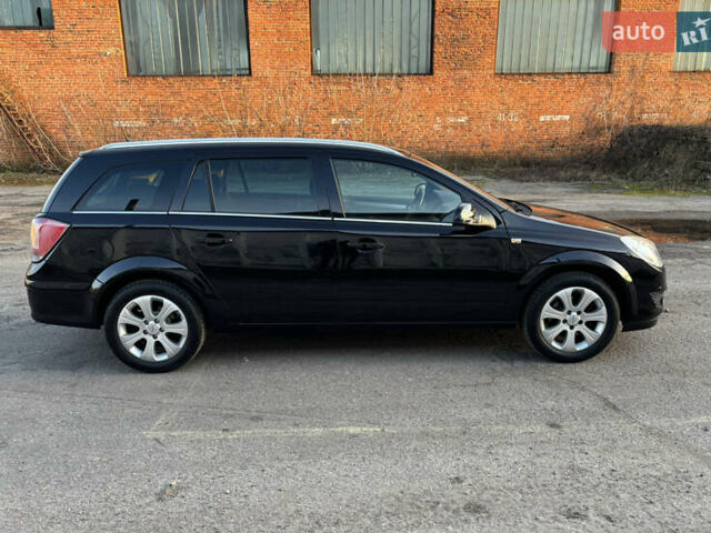 Черный Опель Астра, объемом двигателя 1.6 л и пробегом 217 тыс. км за 6200 $, фото 7 на Automoto.ua