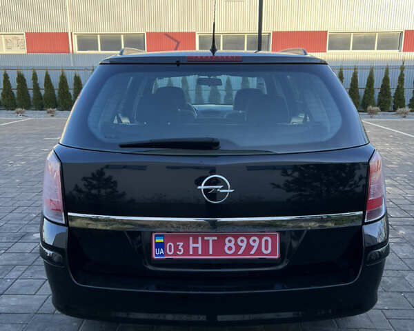 Черный Опель Астра, объемом двигателя 1.4 л и пробегом 242 тыс. км за 4450 $, фото 15 на Automoto.ua