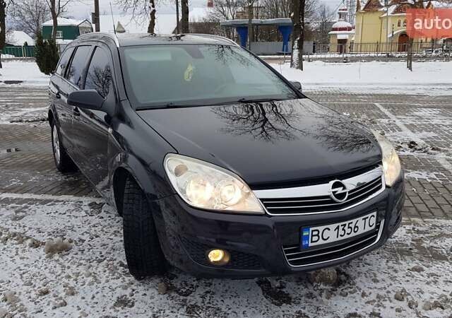 Черный Опель Астра, объемом двигателя 1.7 л и пробегом 332 тыс. км за 5599 $, фото 3 на Automoto.ua