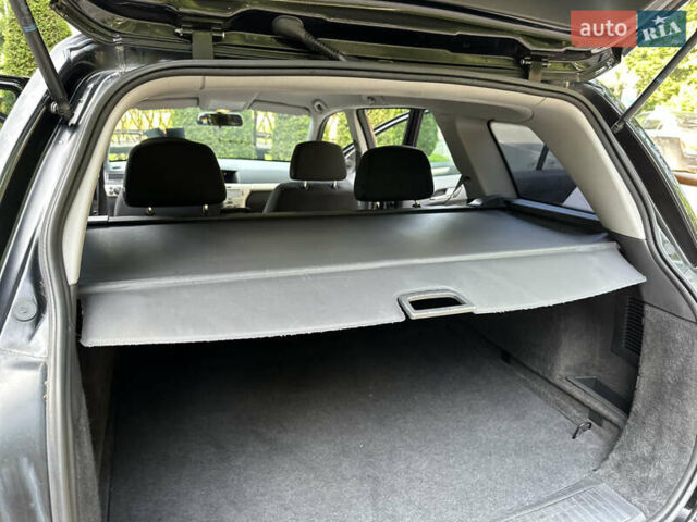 Черный Опель Астра, объемом двигателя 1.6 л и пробегом 157 тыс. км за 5499 $, фото 139 на Automoto.ua
