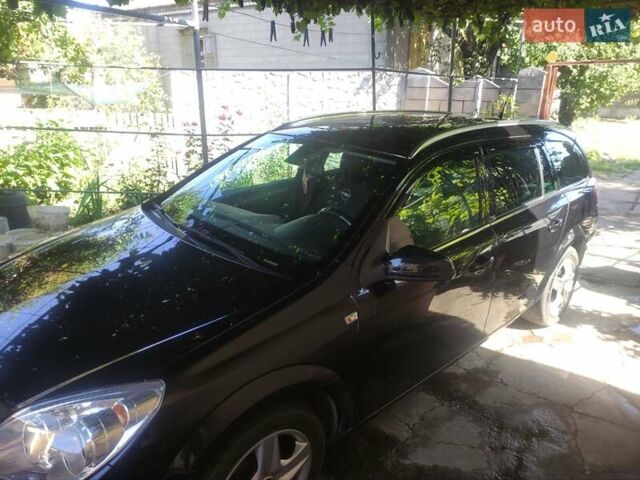 Черный Опель Астра, объемом двигателя 1.6 л и пробегом 205 тыс. км за 5700 $, фото 15 на Automoto.ua