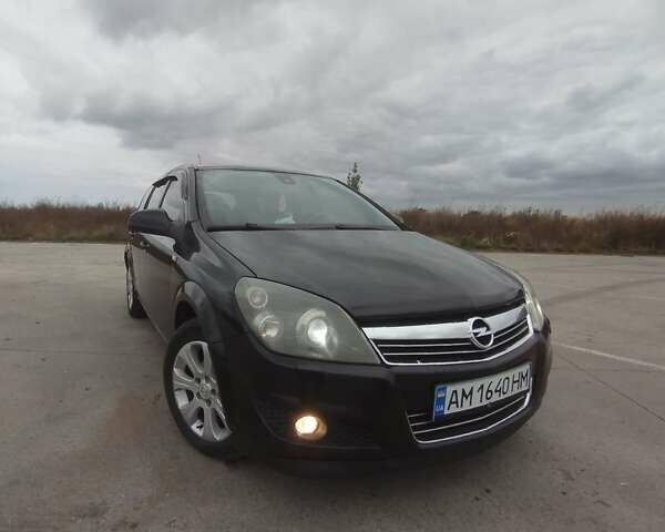 Черный Опель Астра, объемом двигателя 1.25 л и пробегом 325 тыс. км за 4699 $, фото 6 на Automoto.ua