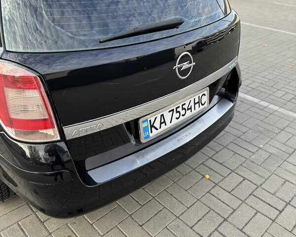 Черный Опель Астра, объемом двигателя 1.69 л и пробегом 223 тыс. км за 5900 $, фото 3 на Automoto.ua