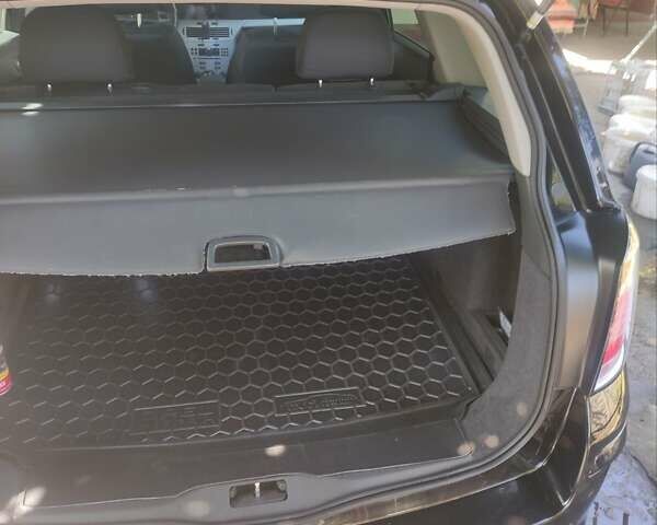 Черный Опель Астра, объемом двигателя 1.6 л и пробегом 205 тыс. км за 5700 $, фото 33 на Automoto.ua