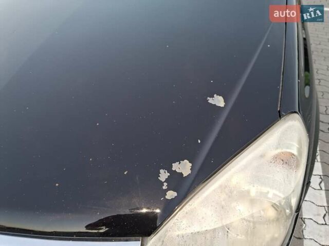 Черный Опель Астра, объемом двигателя 1.7 л и пробегом 276 тыс. км за 4300 $, фото 7 на Automoto.ua