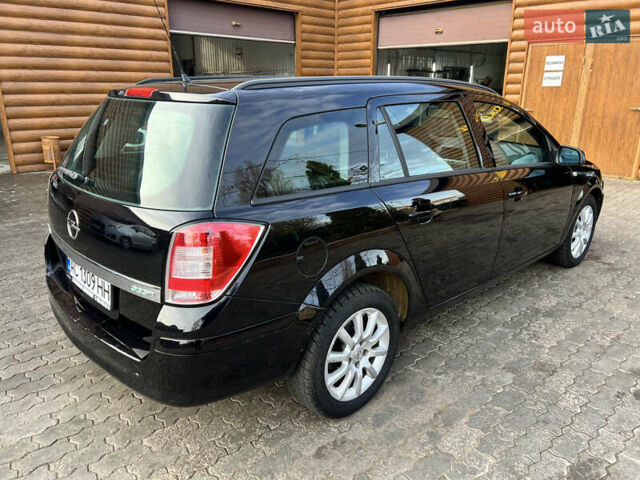 Черный Опель Астра, объемом двигателя 1.69 л и пробегом 192 тыс. км за 5900 $, фото 6 на Automoto.ua