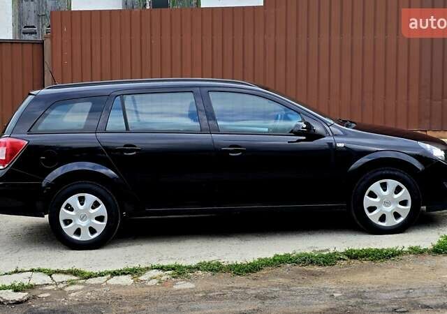 Черный Опель Астра, объемом двигателя 1.6 л и пробегом 238 тыс. км за 6299 $, фото 16 на Automoto.ua