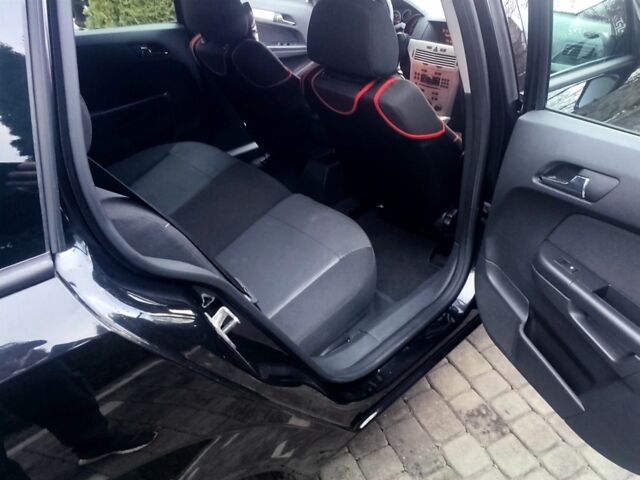 Черный Опель Астра, объемом двигателя 1.6 л и пробегом 220 тыс. км за 5800 $, фото 12 на Automoto.ua