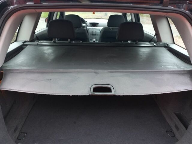 Черный Опель Астра, объемом двигателя 1.8 л и пробегом 200 тыс. км за 5750 $, фото 22 на Automoto.ua