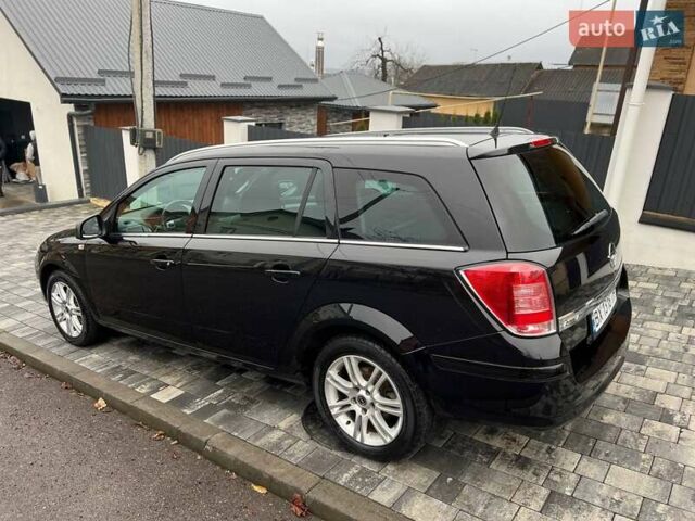 Черный Опель Астра, объемом двигателя 1.6 л и пробегом 199 тыс. км за 6499 $, фото 19 на Automoto.ua