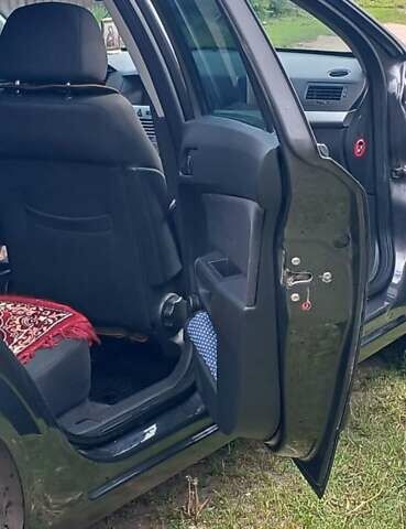 Черный Опель Астра, объемом двигателя 1.8 л и пробегом 164 тыс. км за 5500 $, фото 43 на Automoto.ua