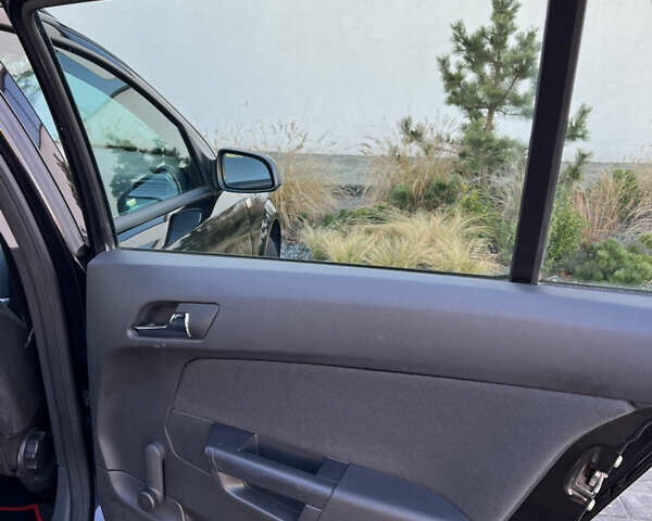 Черный Опель Астра, объемом двигателя 1.4 л и пробегом 242 тыс. км за 4450 $, фото 57 на Automoto.ua