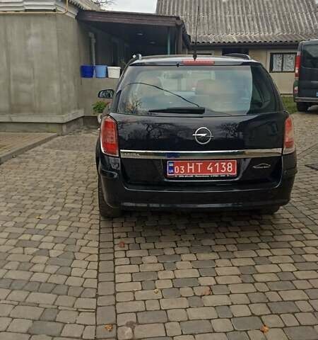 Черный Опель Астра, объемом двигателя 1.6 л и пробегом 249 тыс. км за 5650 $, фото 5 на Automoto.ua