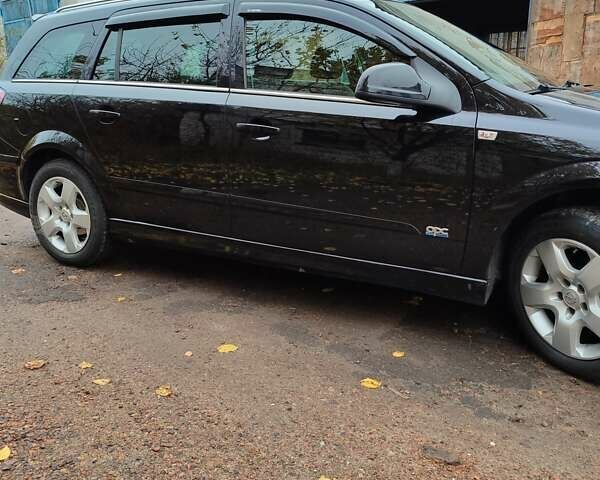 Черный Опель Астра, объемом двигателя 1.8 л и пробегом 225 тыс. км за 6800 $, фото 4 на Automoto.ua