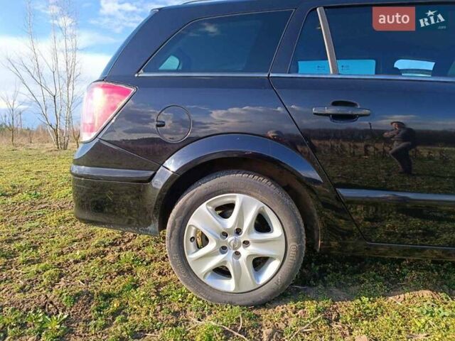 Черный Опель Астра, объемом двигателя 1.8 л и пробегом 225 тыс. км за 5700 $, фото 4 на Automoto.ua