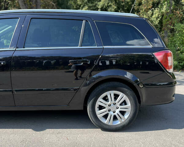 Черный Опель Астра, объемом двигателя 1.6 л и пробегом 250 тыс. км за 6099 $, фото 3 на Automoto.ua