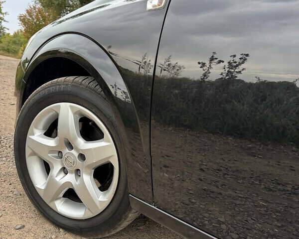 Черный Опель Астра, объемом двигателя 1.6 л и пробегом 230 тыс. км за 5750 $, фото 30 на Automoto.ua