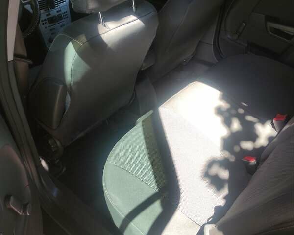 Черный Опель Астра, объемом двигателя 1.6 л и пробегом 205 тыс. км за 5700 $, фото 28 на Automoto.ua