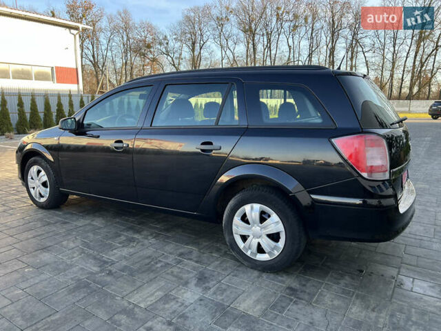 Черный Опель Астра, объемом двигателя 1.4 л и пробегом 242 тыс. км за 4450 $, фото 12 на Automoto.ua