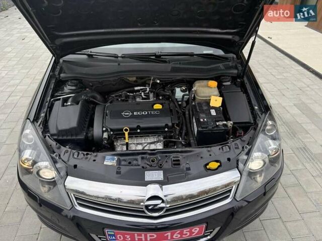 Черный Опель Астра, объемом двигателя 1.6 л и пробегом 240 тыс. км за 5550 $, фото 14 на Automoto.ua