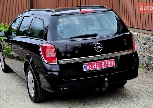 Черный Опель Астра, объемом двигателя 1.6 л и пробегом 238 тыс. км за 6299 $, фото 23 на Automoto.ua