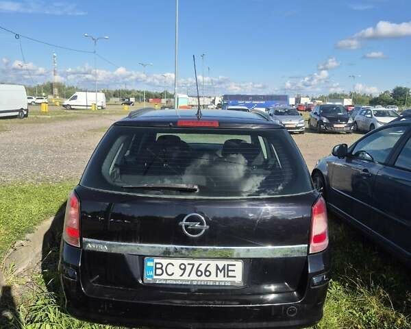 Черный Опель Астра, объемом двигателя 1.6 л и пробегом 200 тыс. км за 4900 $, фото 7 на Automoto.ua