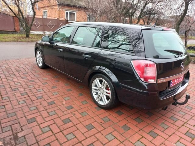 Черный Опель Астра, объемом двигателя 1.8 л и пробегом 200 тыс. км за 5750 $, фото 8 на Automoto.ua